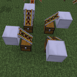 4 sloped powered rails on top of chests