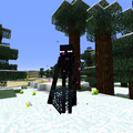 An enderman holding a spawner.