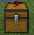 A single unconnected piece of redstone on top of a chest