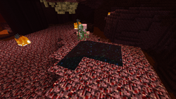 A zombified piglin standing inside end portal blocks and not being affected as they did nothing yet.