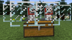 Two stone pressure plates on a double chest that are constantly being pressed down by two tamed sitting wolves (can be 1 in between both)