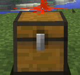 A single unconnected piece of redstone on top of a chest at power strength 15